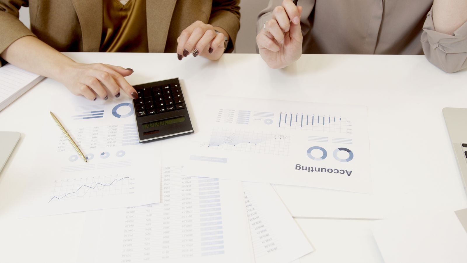 Accountants reviewing UAE bookkeeping and financial records for a Dubai business