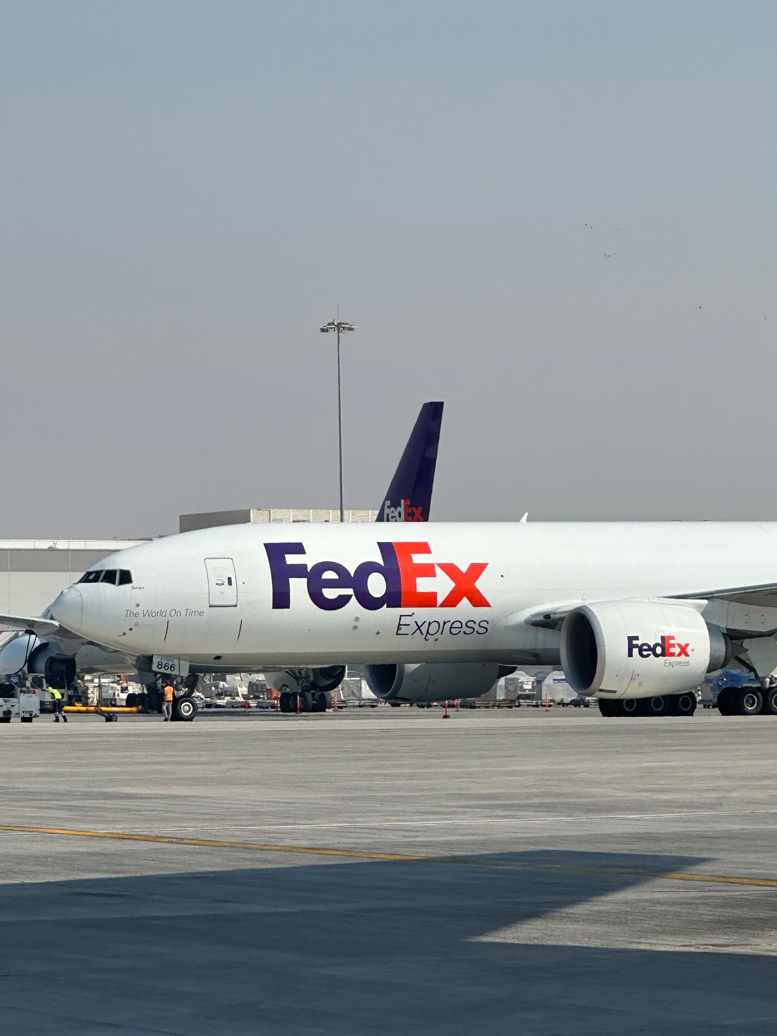 A cargo aircraft at Dubai International Airport, UAE, near the DAFZA free zone