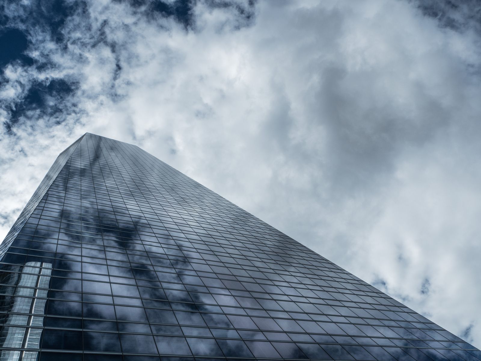 Modern glass office tower representing UAE mainland company licensing